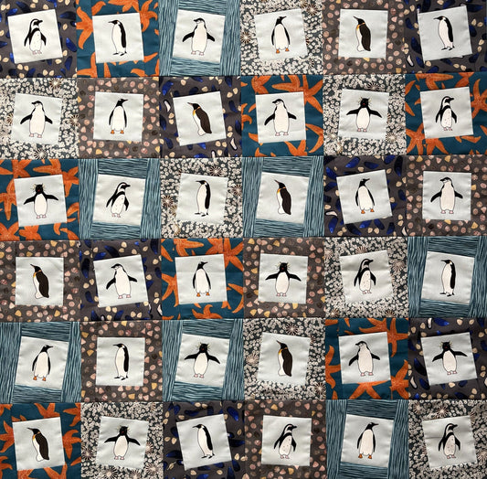 Waddling penguins quilt