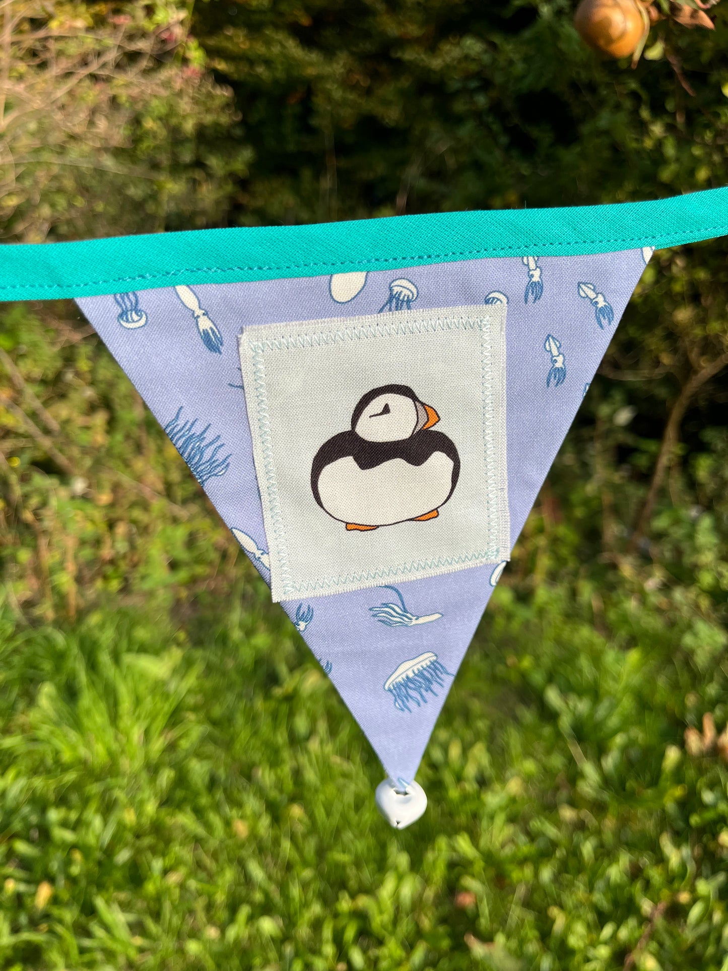 Puffin or penguin bunting.