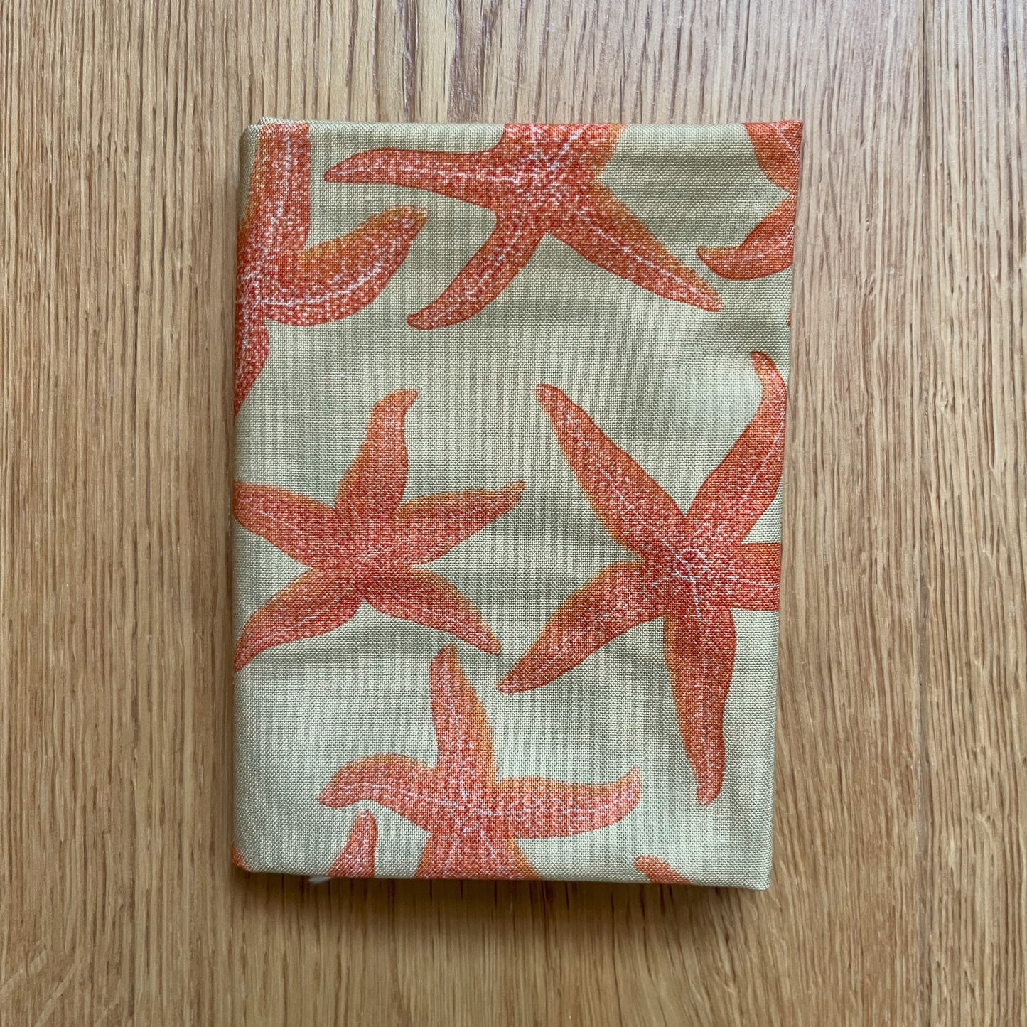 Starfish fat quarter - sand background
